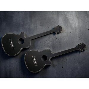 vintage pair of metal die/laser cut wall mount guitar silhouettes.
